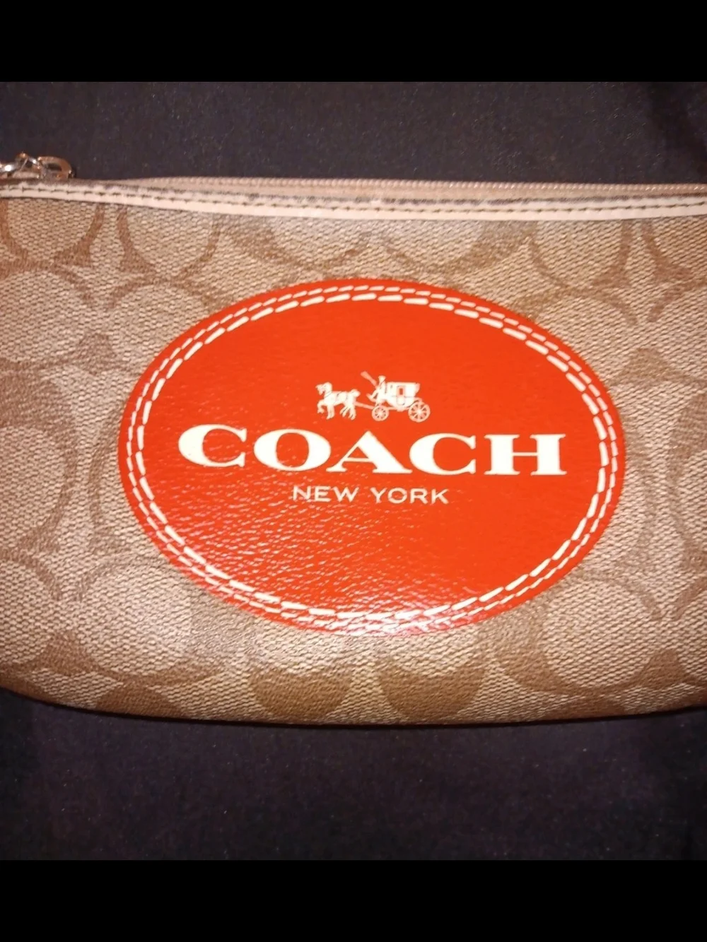 Coach Large Wristlet in Tan with Red Logo Patch